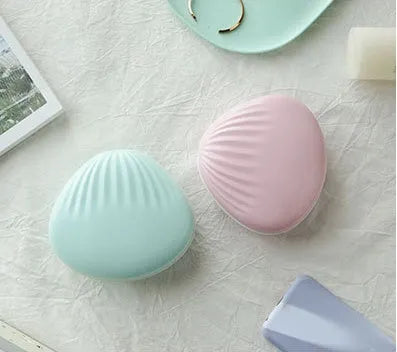 Shell rainbow projection light in blue or pink, ABS plastic, 130 x 118 x 54mm, USB 5V 1A, 1200mAh battery.