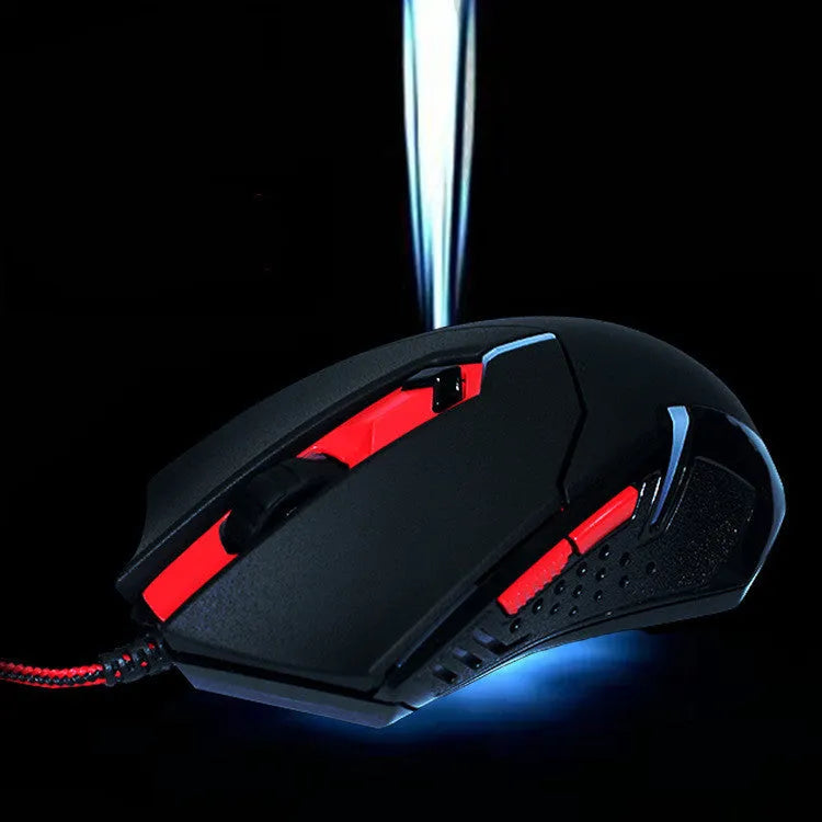 Black and red USB wired gaming mouse with six buttons and ergonomic design on desktop