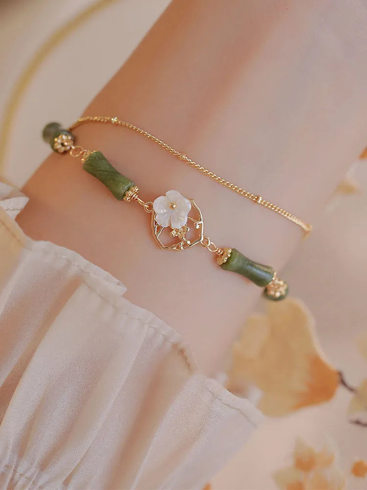 Green olivine double layer bracelet with Bells of Ireland charms and olive branch detailing for women