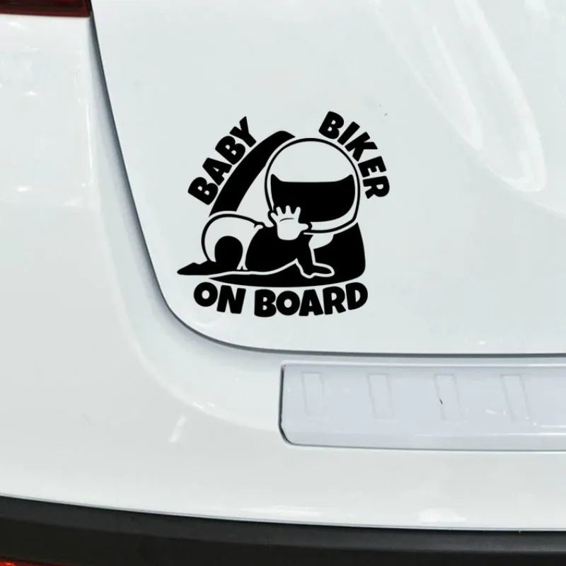 Black and white versions of a reflective BABY ON BOARD car sticker measuring 14.5 by 15 cm.