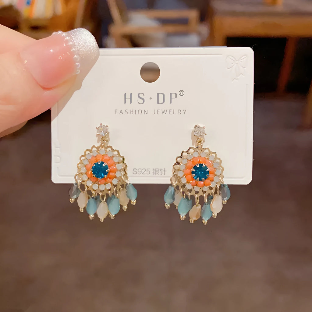 Blue diamond round crystal tassel earrings with thick gold plating and geometric design on copper base