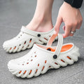 Men's beige EVA slipper sandals with a hole-patterned upper and non-slip sole.