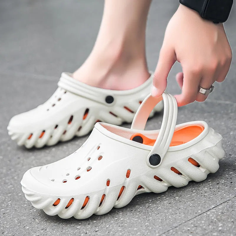 Men's beige EVA slipper sandals with a hole-patterned upper and non-slip sole.