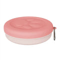 Folding portable dog food bowl with separate snack compartment in pink colour