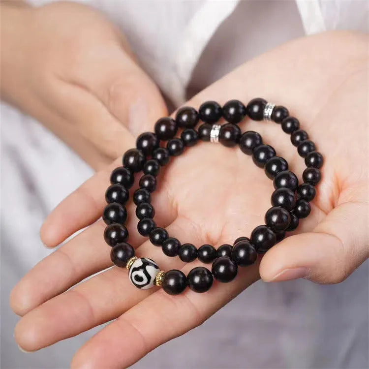 Tibetan ebony wood beads bracelet with 8mm beads and adjustable knot closure