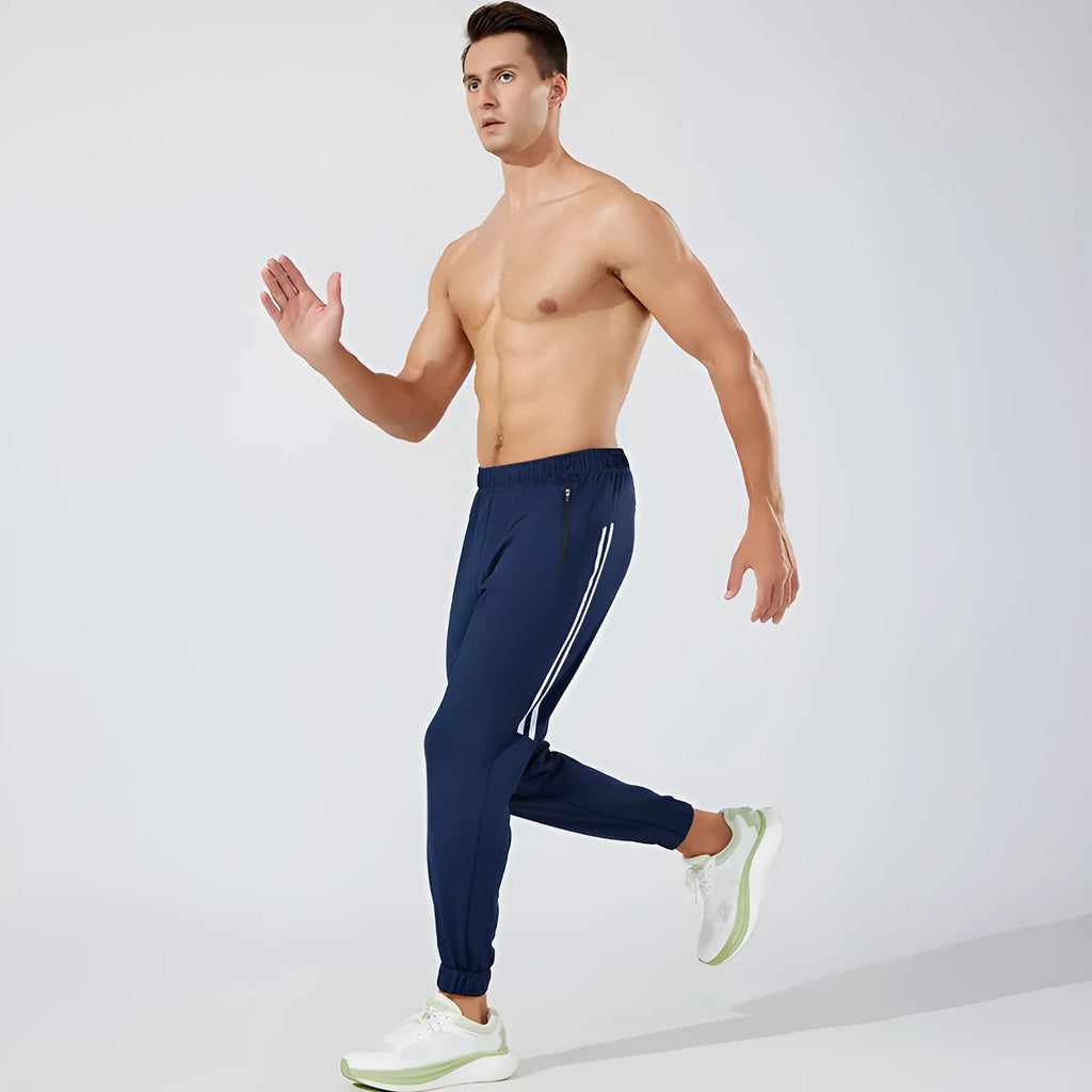 Men's black polyester running trousers with mid waist design for exercise
