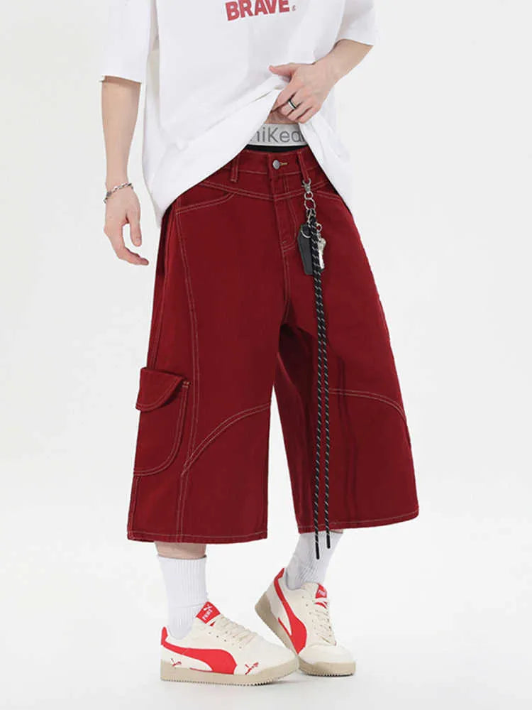 Retro denim workwear shorts with wide leg design and multiple pockets in red and black colours