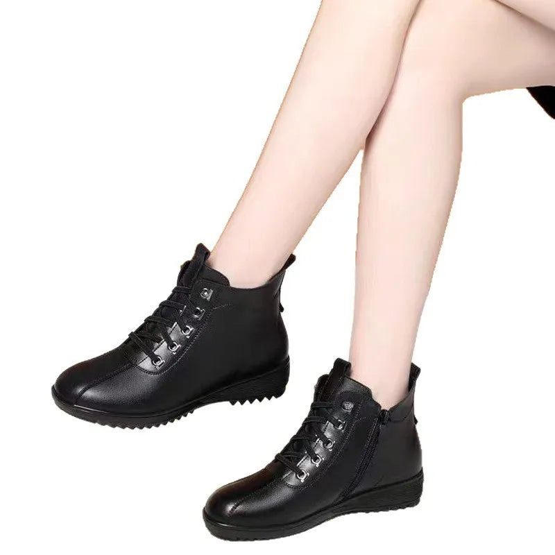 Women's black artificial PU casual shoes with side zipper and low top mid heel design