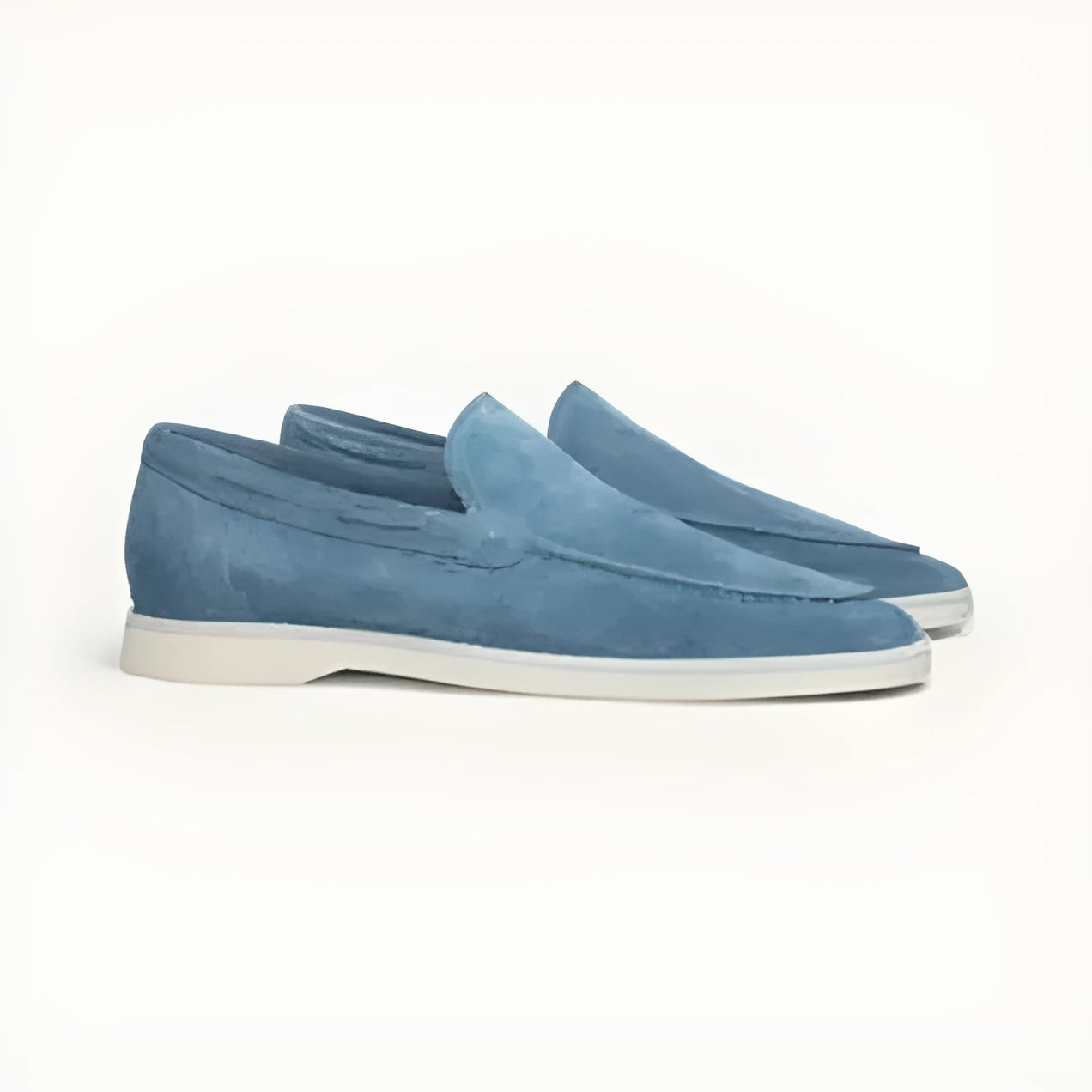 Men's matte suede flat shoes in sky blue with rubber sole and round toe, shown on plain background