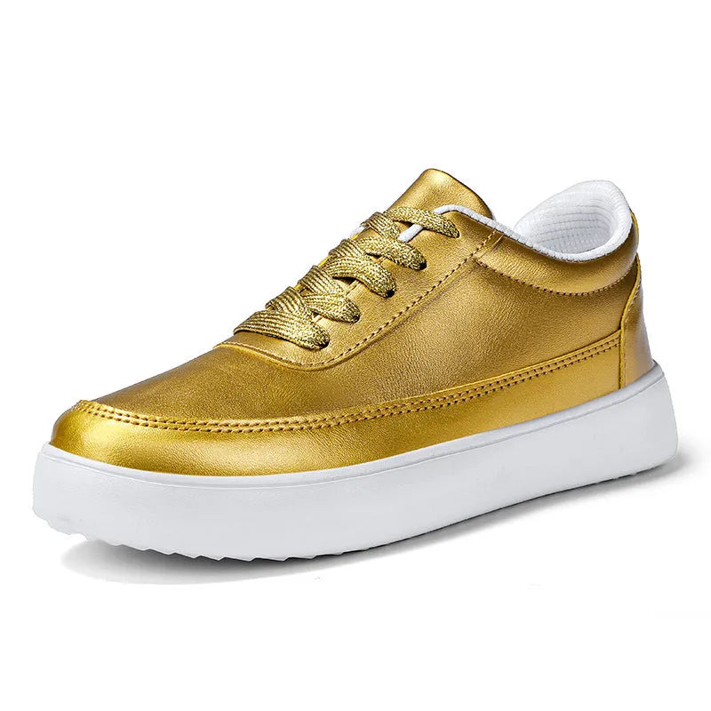 Women's white leather flat lace-up casual shoes on a plain background