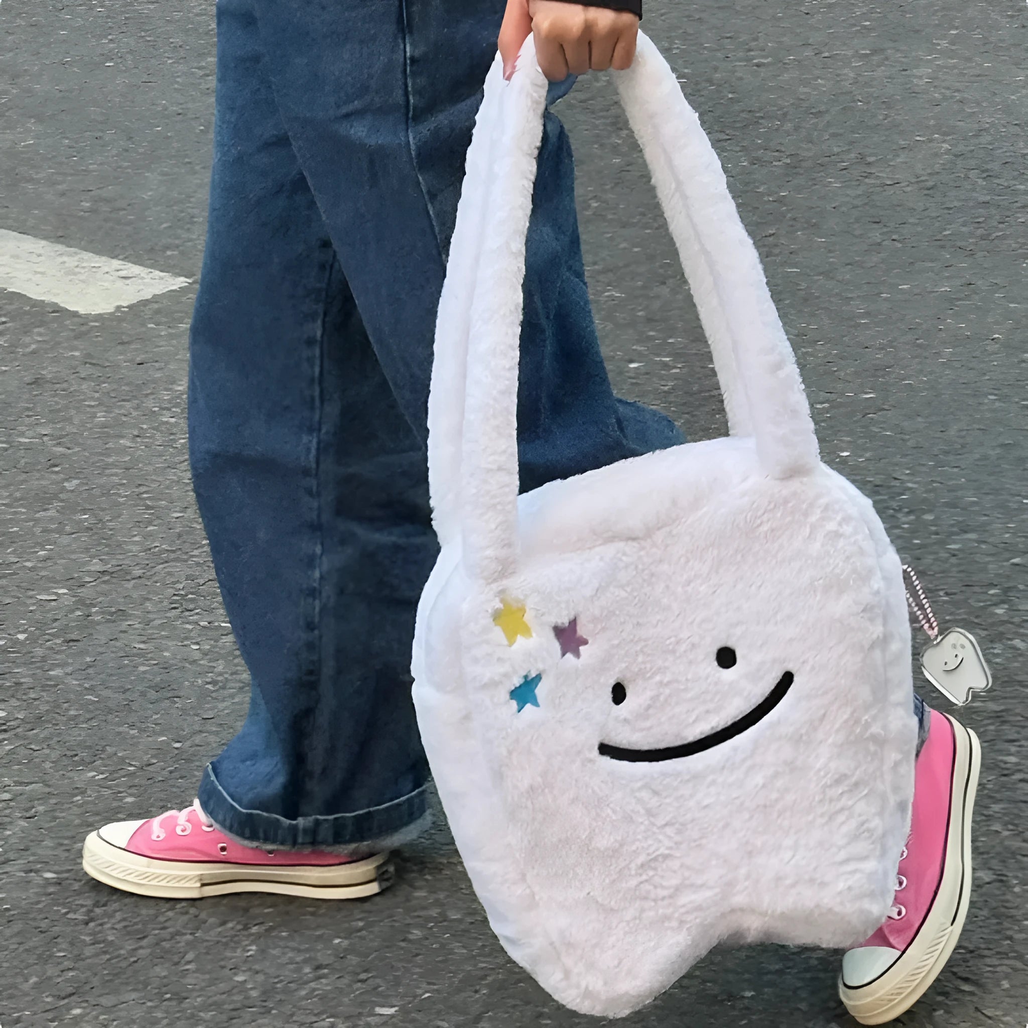 White plush tote bag with cute tooth pattern, zipper closure, and shoulder strap