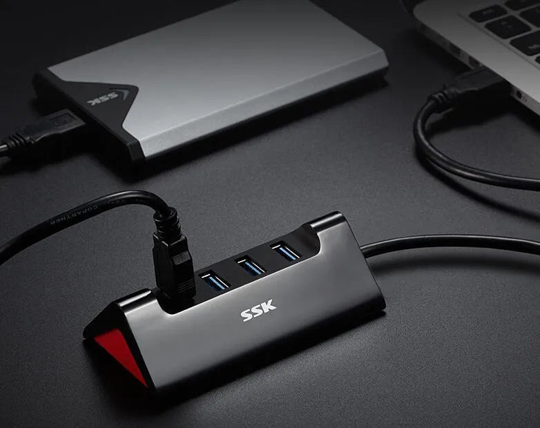 Black USB expansion dock with four ports and Micro USB power interface