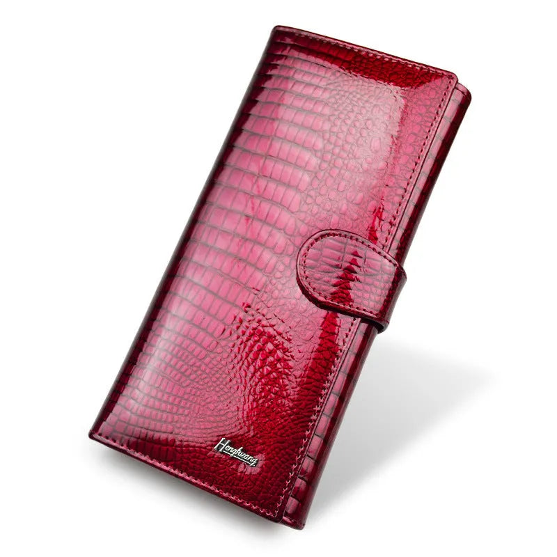 Women's leather coin purse with crocodile pattern texture in wine red, black, or red colours