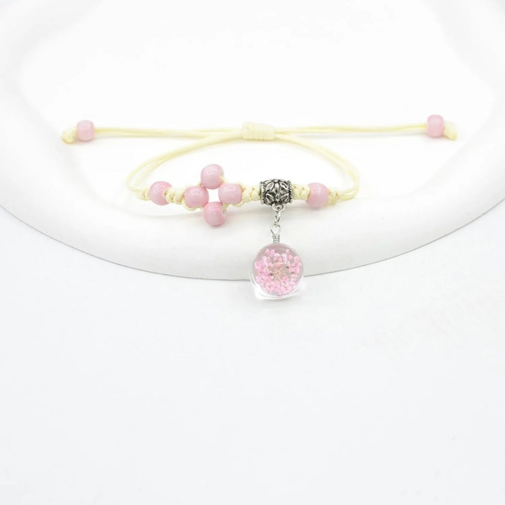 Glass dried flower bracelet with large 1.4cm beads containing real preserved flowers in various colours