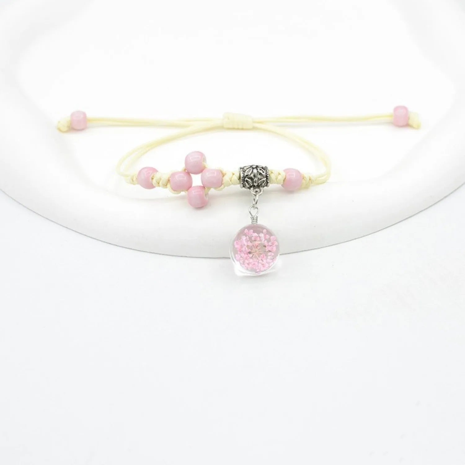 Glass dried flower bracelet with large 1.4cm beads containing real preserved flowers in various colours