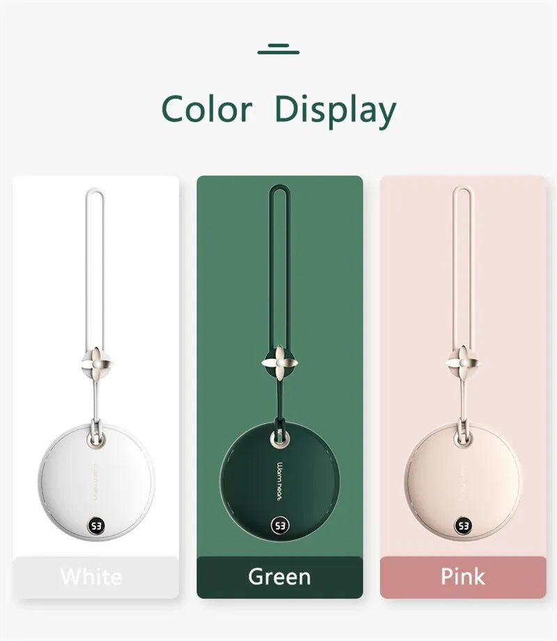Green Pink or White coloured 5000mAh hand warmer power bank with digital display showing charge level.
