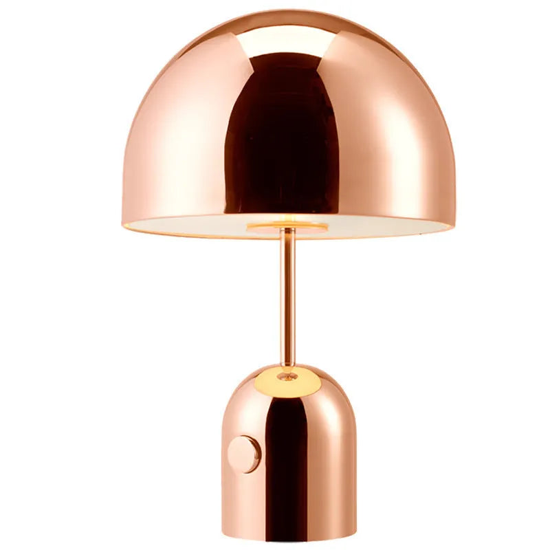 Post-modern metal table lamp with 280mm diameter in rose gold finish on wooden surface