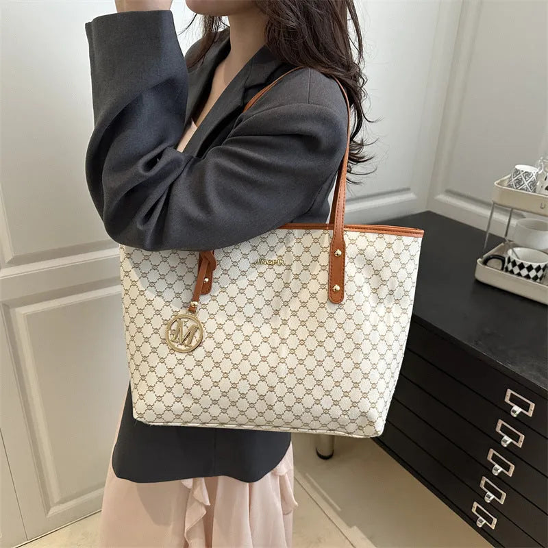Black PU street style shoulder bag with visible stitching, shown next to grey, white, and brown colour options.