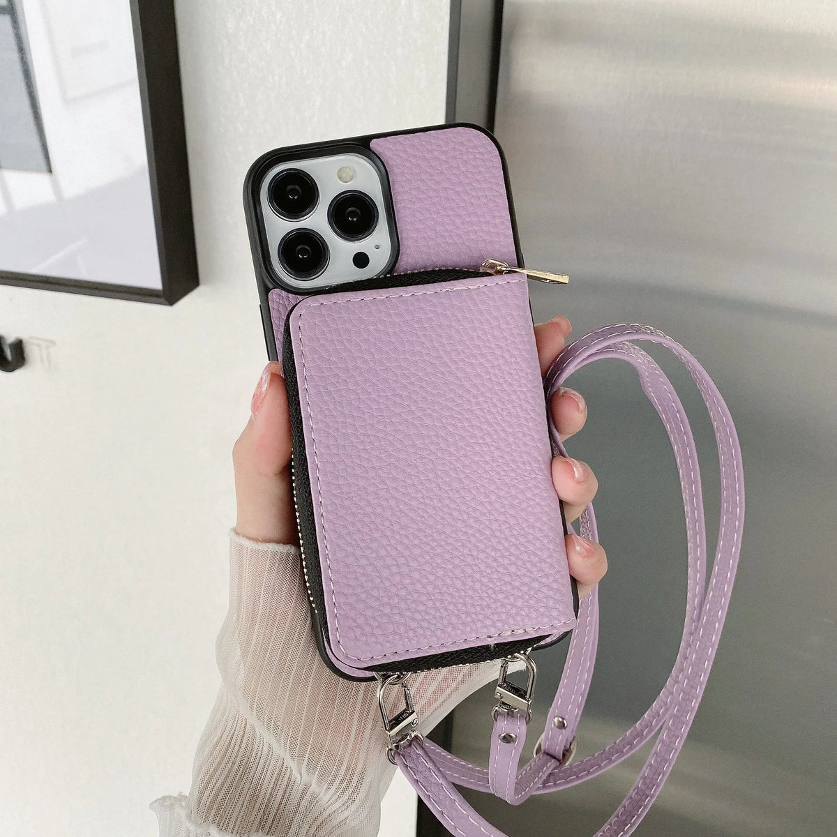 Litchi pattern textured protective case for iPhone on a table, shown in a selection of available colours.