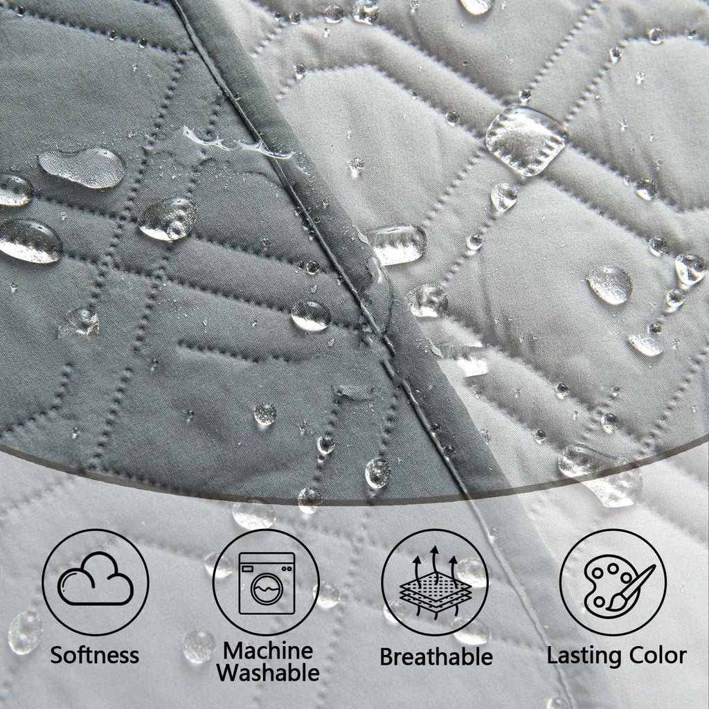 Reversible waterproof dog cushion on a sofa in dark grey and light grey contrast colours.