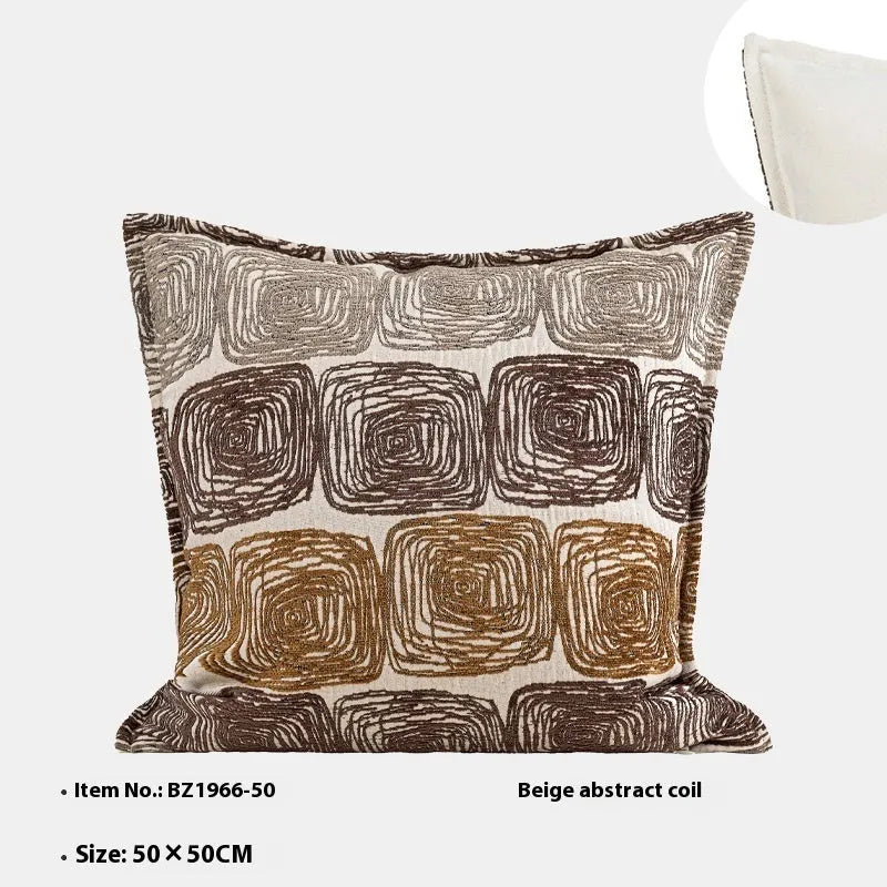 Cream and coffee coloured abstract coil pattern square pillow cover made from polyester feather velvet.