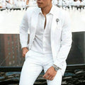 White slim fit two-piece men's suit jacket and trousers for weddings.