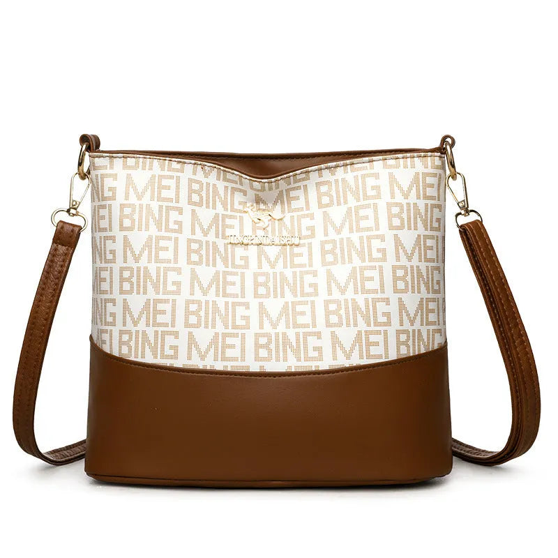 Retro soft PU messenger bag in brown with sewing thread detail and horizontal square shape