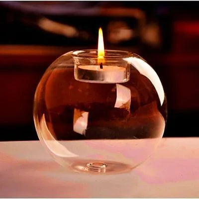 Clear round hollow glass candle holder handmade using hot glass frying table technique