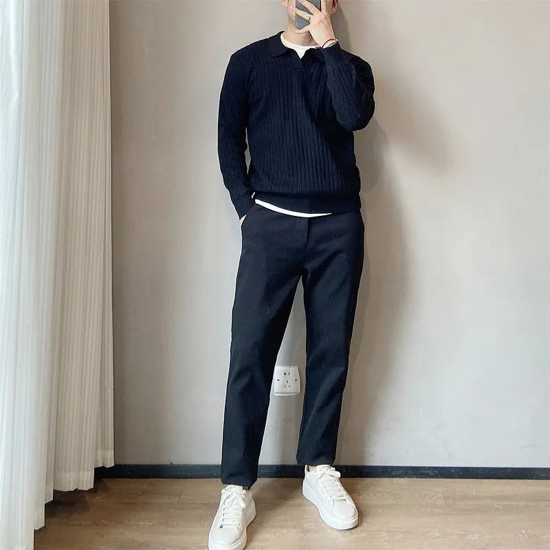 A boys' loose striped pullover sweater with a lapel collar, shown in a light grey colour.