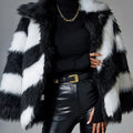 Faux fur coat with contrast lapel and fur collar in polyester fabric