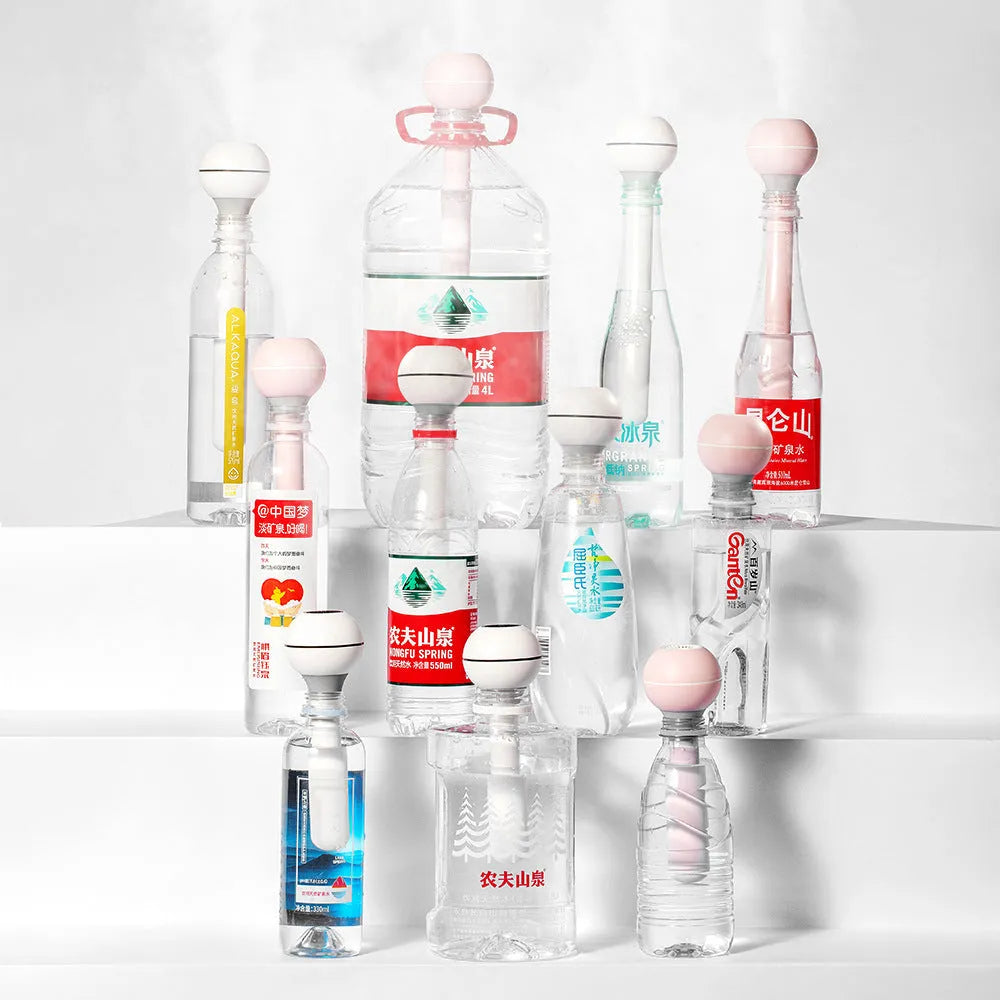 Columnar USB-powered humidifier with transparent 1-litre water tank in pink colour option