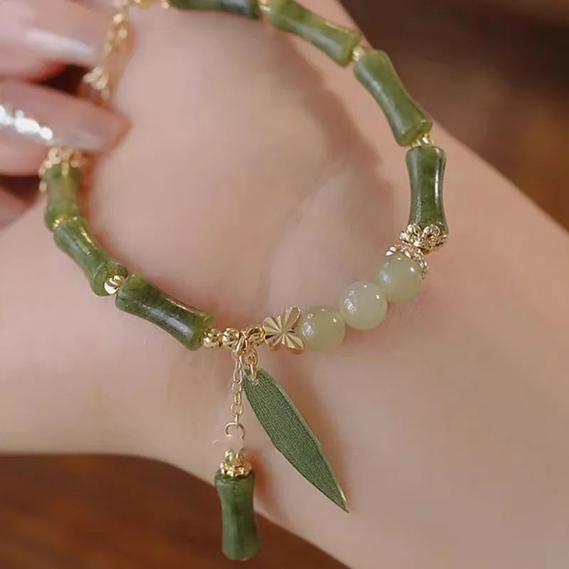 Chinese style glass bamboo leaf bracelet for women with manual craft details.