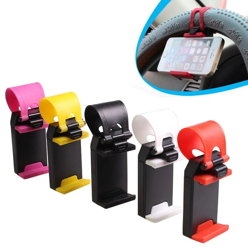 Black steering wheel phone holder clip mounted on car steering wheel holding smartphone