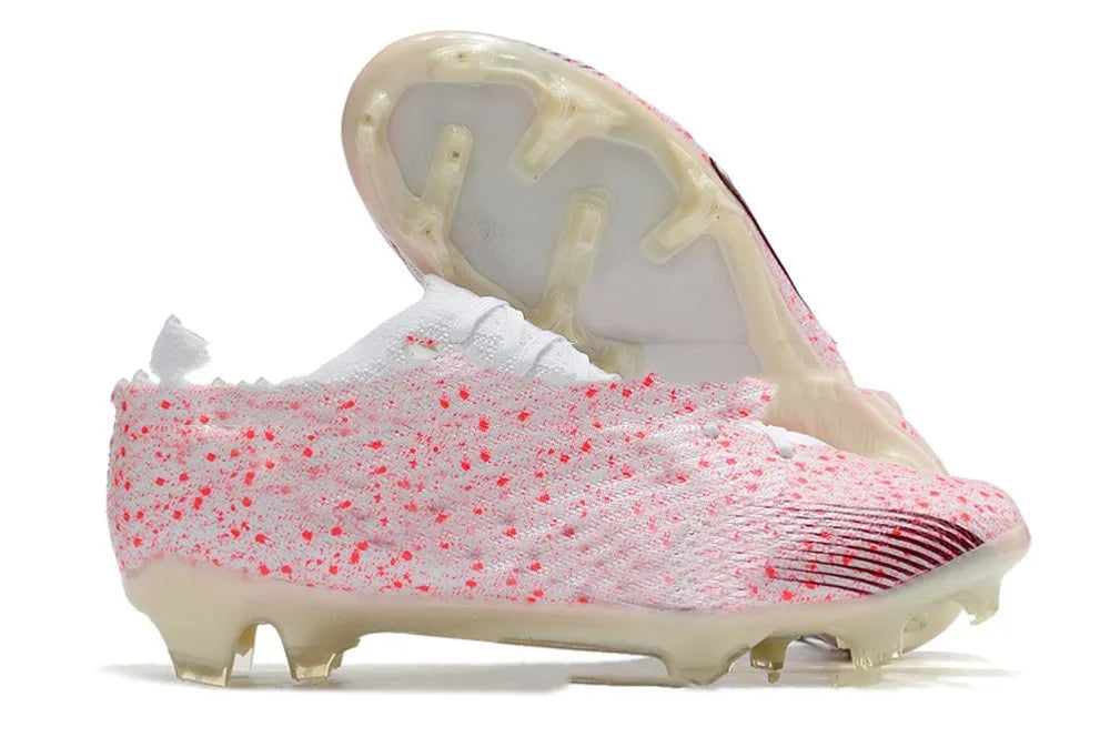 Men's knitted football boots with FG studs and air cushion system
