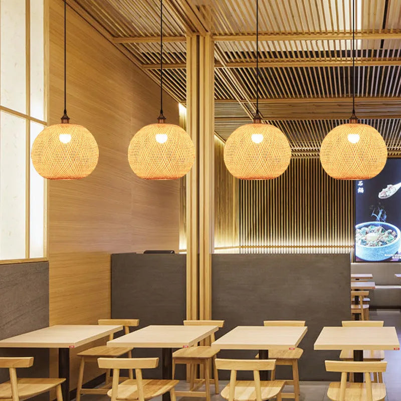 Zen-style pastoral ceiling chandelier with a woven natural rattan lampshade.