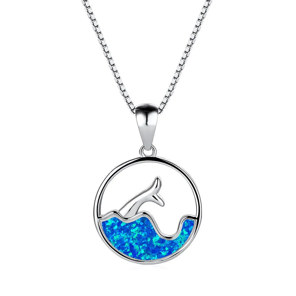 Geometric sea fishtail pendant necklace with an electroplated white gold finish and an opal colour variant.
