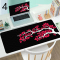 Large rubber gaming mouse desk mat with printed design, available in multiple sizes and thicknesses