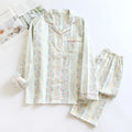 Women's cotton gauze two-piece homewear set with long sleeves and trousers in a striped pattern.