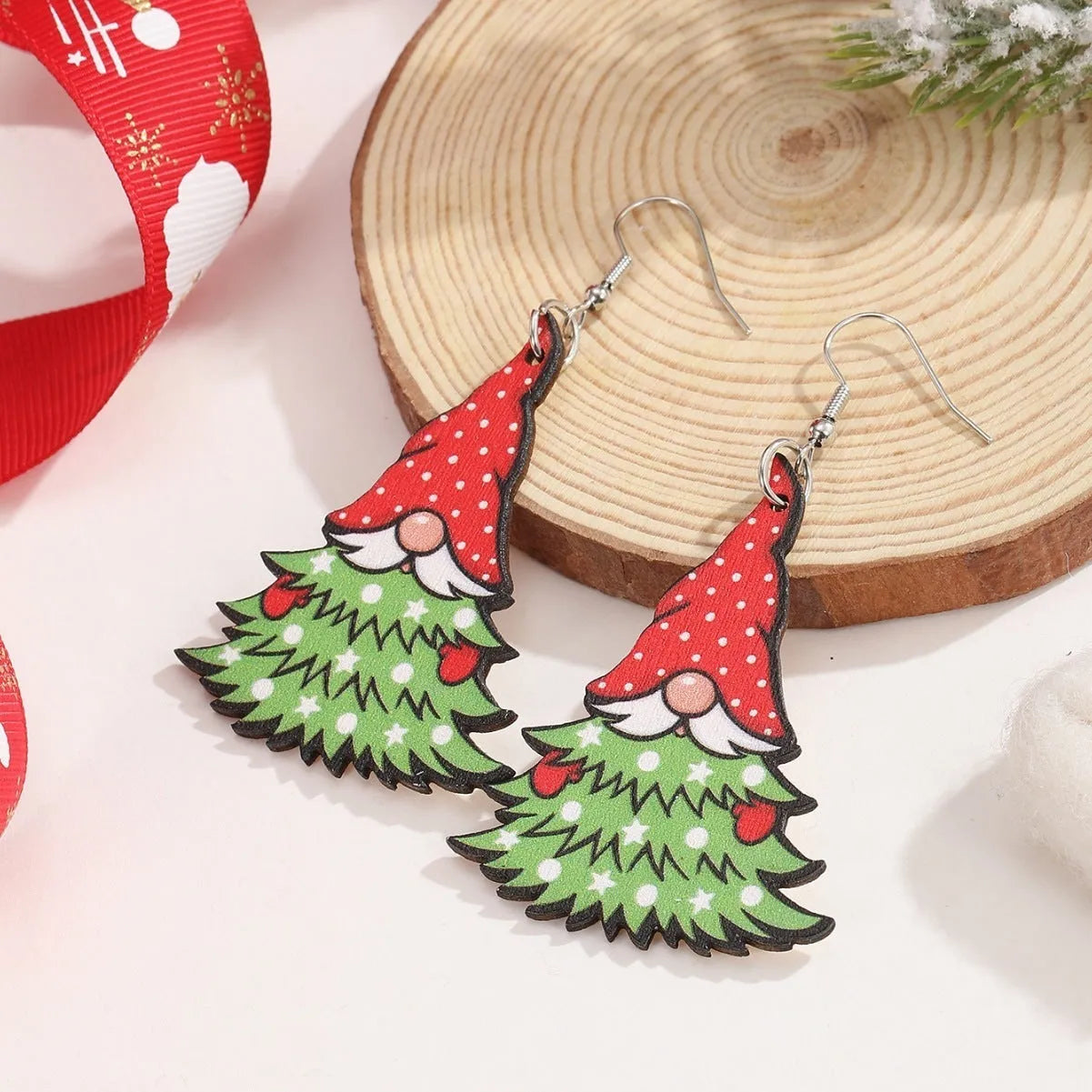 Wooden Christmas earrings with geometric shapes and printed festive designs