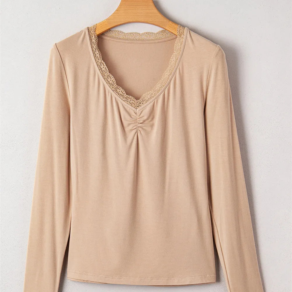 Long sleeve casual top with lace trim detail in solid colour option showing slim fit styling