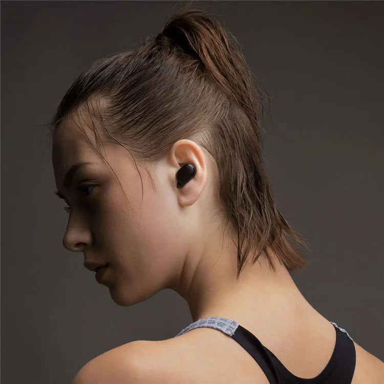 Redmi AirDots Black true wireless Bluetooth earbuds and charging case.