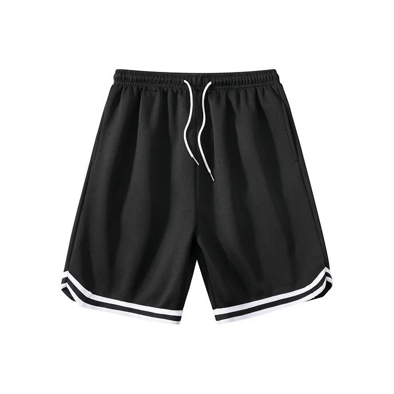 Men's loose blue sports shorts made from polyester fabric on a plain background.