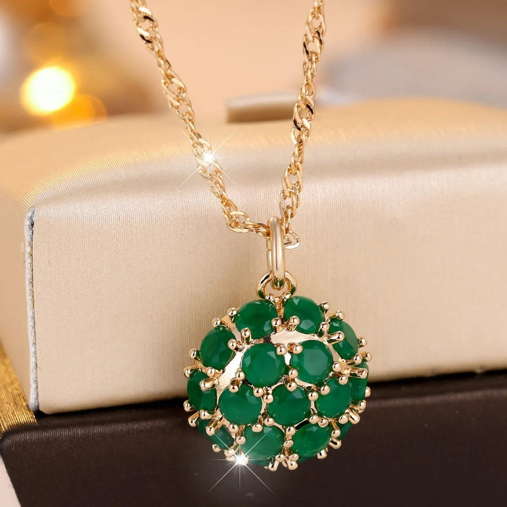 Women's gold plated copper necklace with emerald diamond geometric pendant on adjustable chain