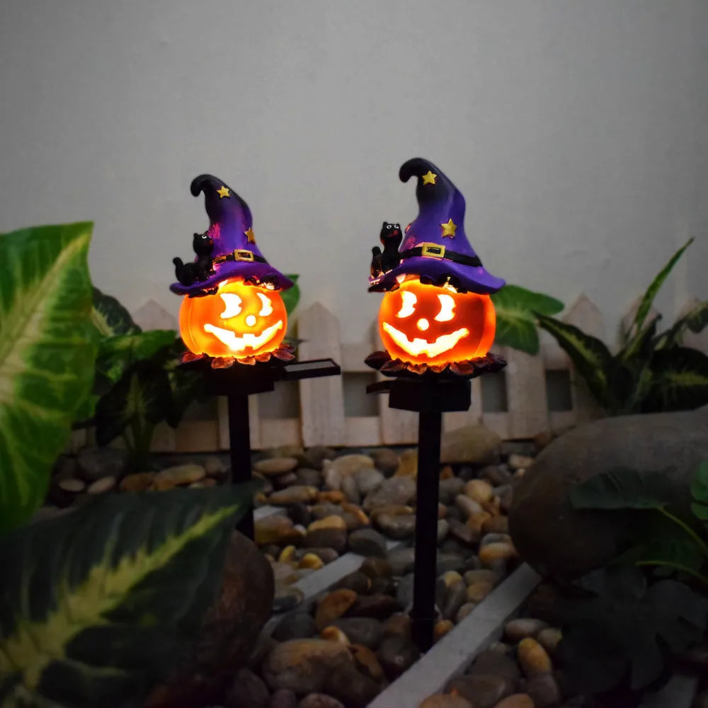 Solar Halloween pumpkin lantern ground stake light with resin pumpkin head and wrought iron stake for outdoor garden decoration