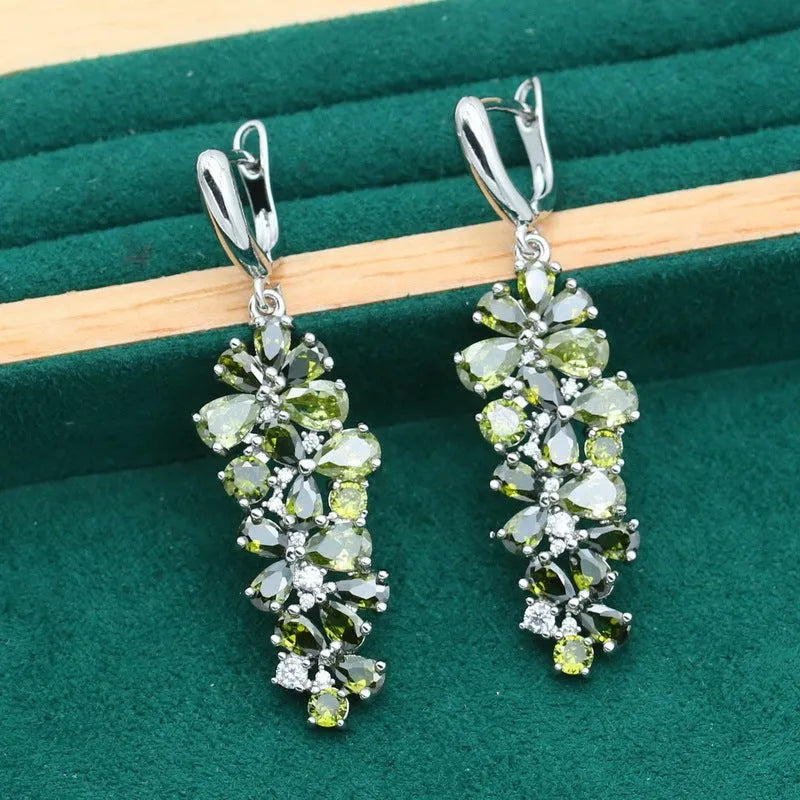 Retro floral pattern jewellery set with copper, zircon, and alloy pendant, showing necklace, bracelet, earrings, and ring in olive and purple colours.