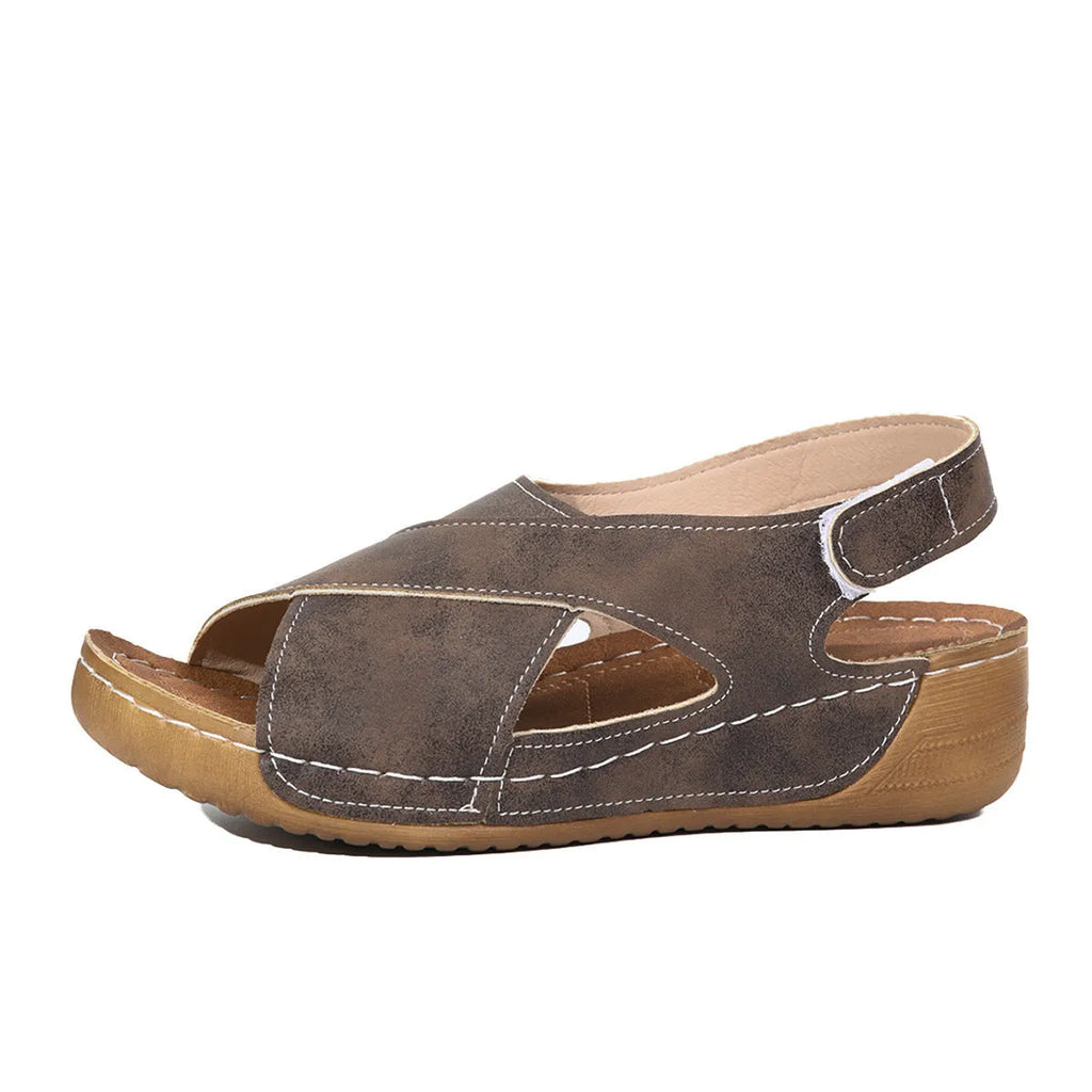 Roman platform sandals with skirt detail, open toe and adjustable Velcro closure in earthy colour
