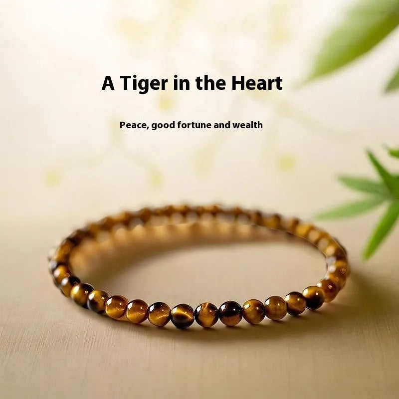 Tigereye stone bracelet with geometric design in New Chinese style showing round beads