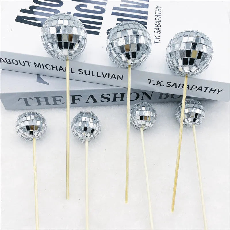 Glass mirror ball cake decoration on wooden stick in four size options for celebration cakes