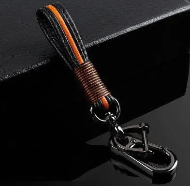 Handmade leather keychain with plastic ring in gun black and red colour option, with key cover