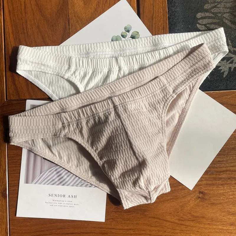 Men's pure cotton triangle briefs in solid colours showing mid-waist design